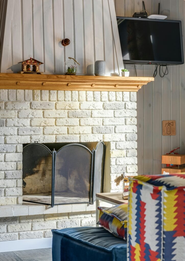 Lime wash fireplace that can be done by Paint E.