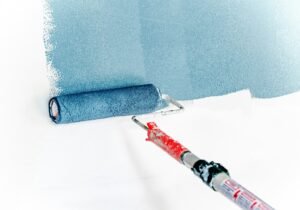blue interior wall paint roller
