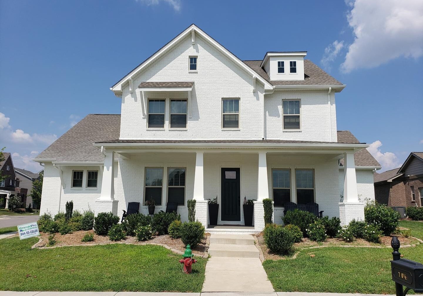 Brick home painted white in Nashville, TN.
