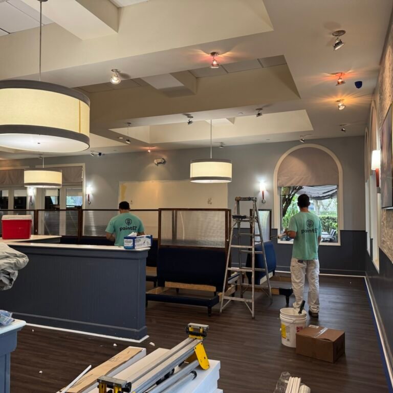 Paint EZ crew prepping a commercial space for painting.