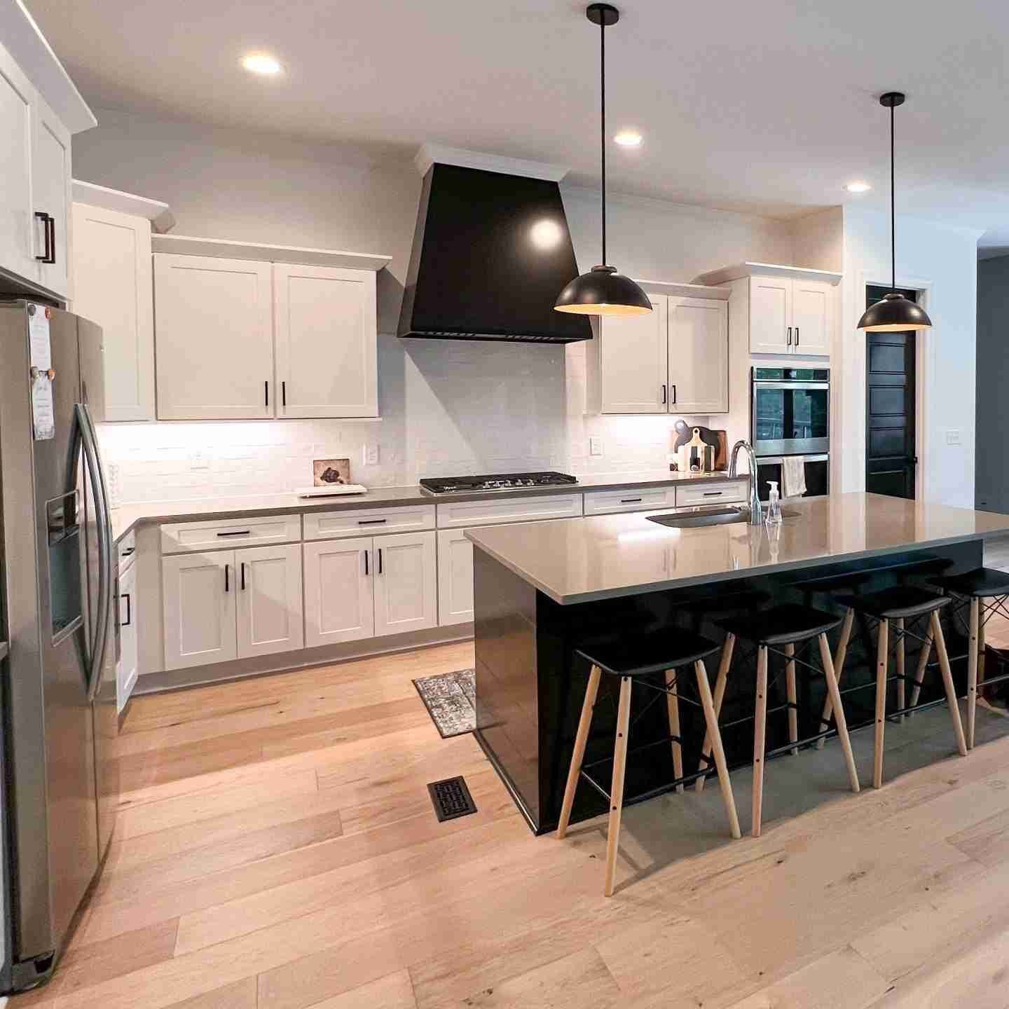 White cabinets painted by the Paint EZ crew.