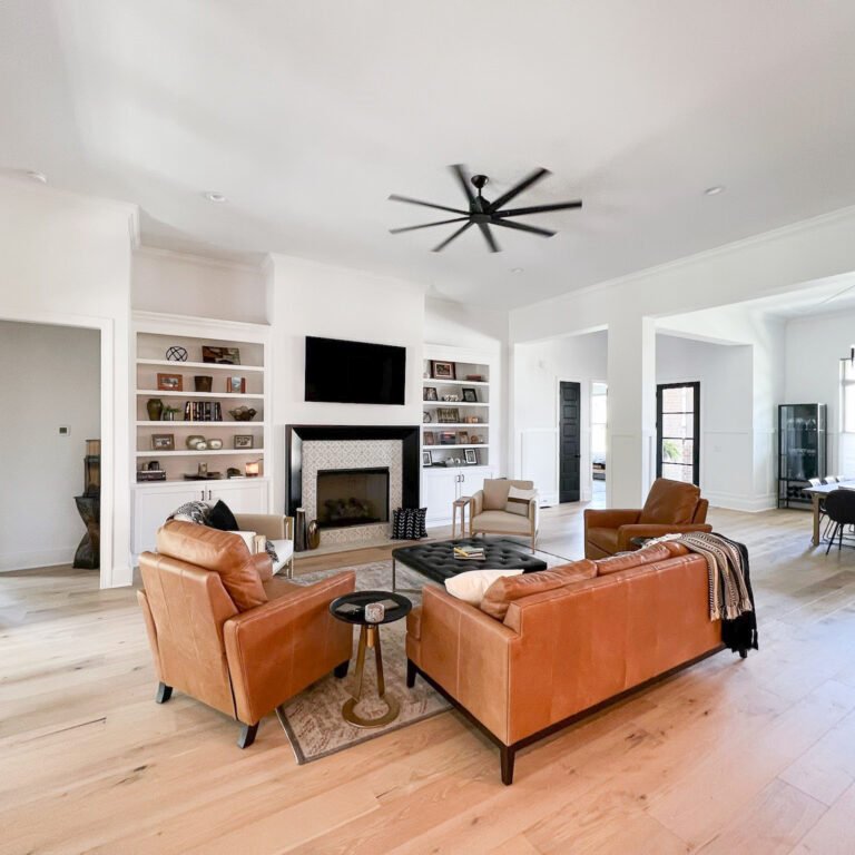 Modern living room with freshly painted interior walls by Paint EZ – professional interior painting services that create bright, beautiful spaces for your home.