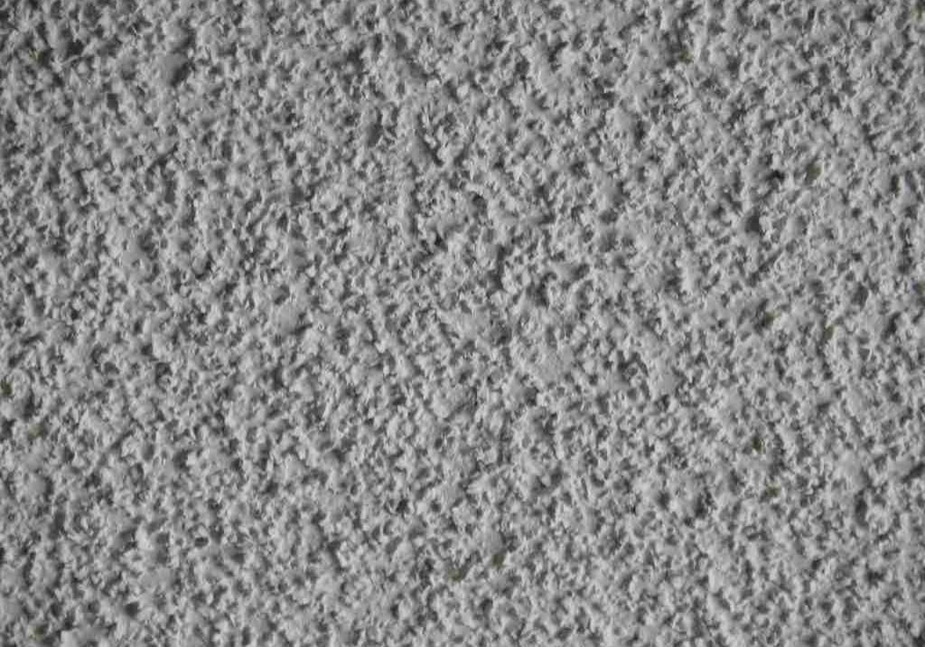 Close up image of popcorn ceiling that can be removed by the Paint EZ crew.
