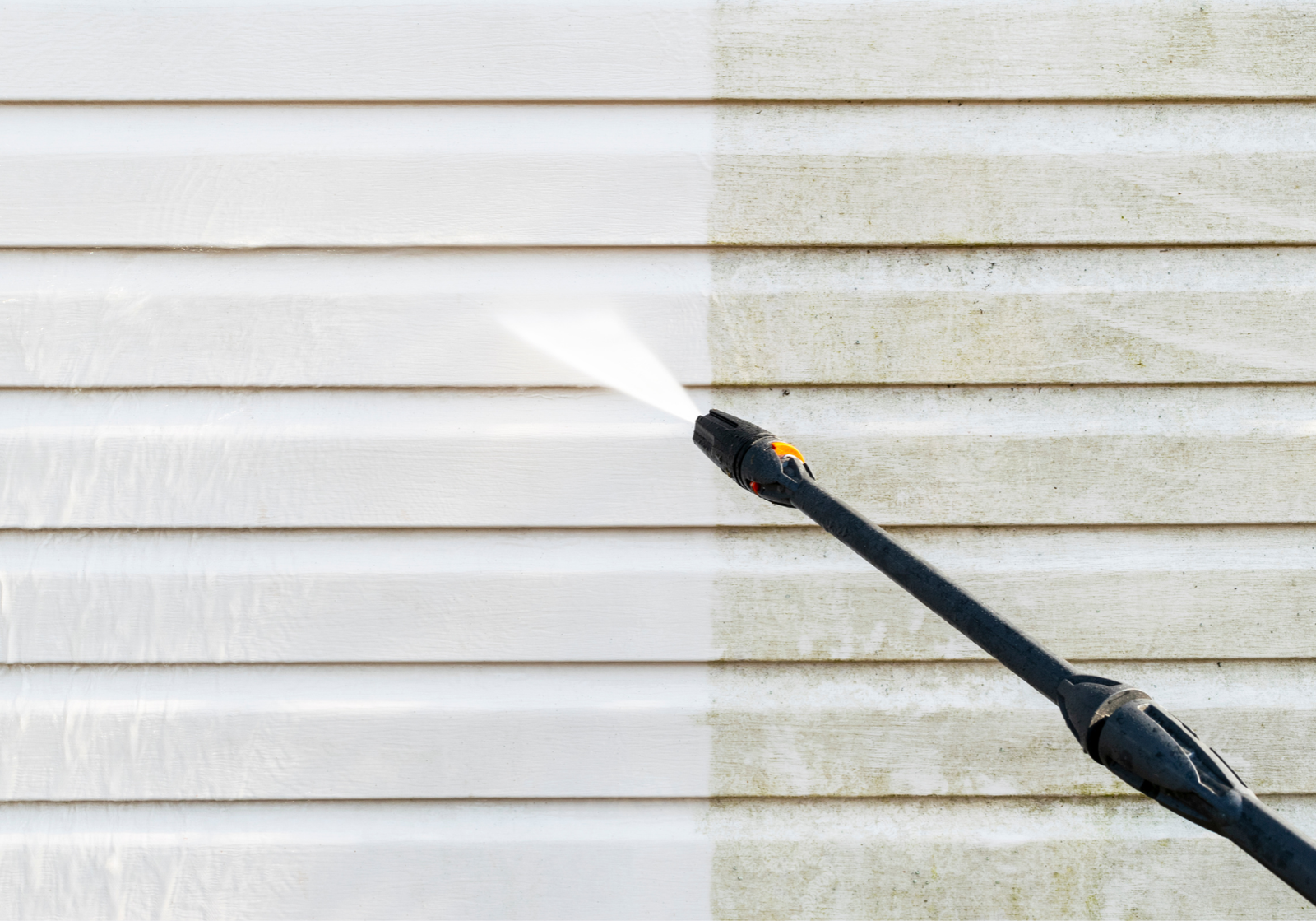 Professional pressure washing by Paint EZ – expert surface preparation services that clean and restore siding before painting or staining.