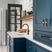 Blue cabinets painted with Gentleman's Gray by Benjamin Moore