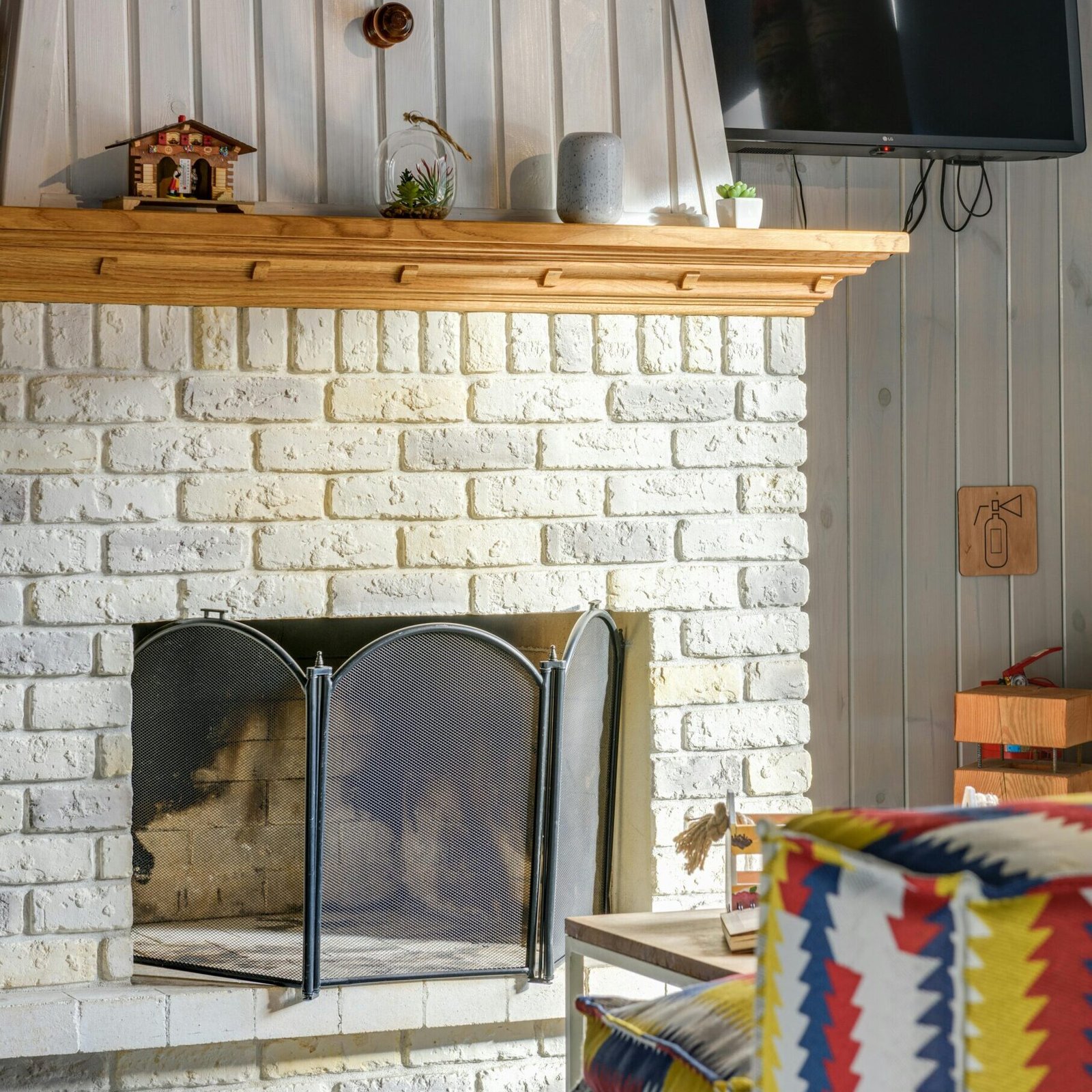 Lime wash fireplace that can be done by Paint E.